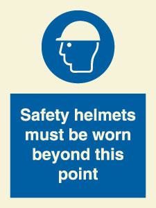 Safety helmets must be worn beyond this point